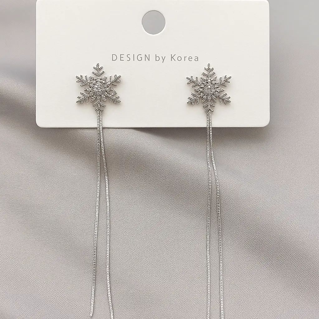 Silver Snowflake Earrings on Card.webp