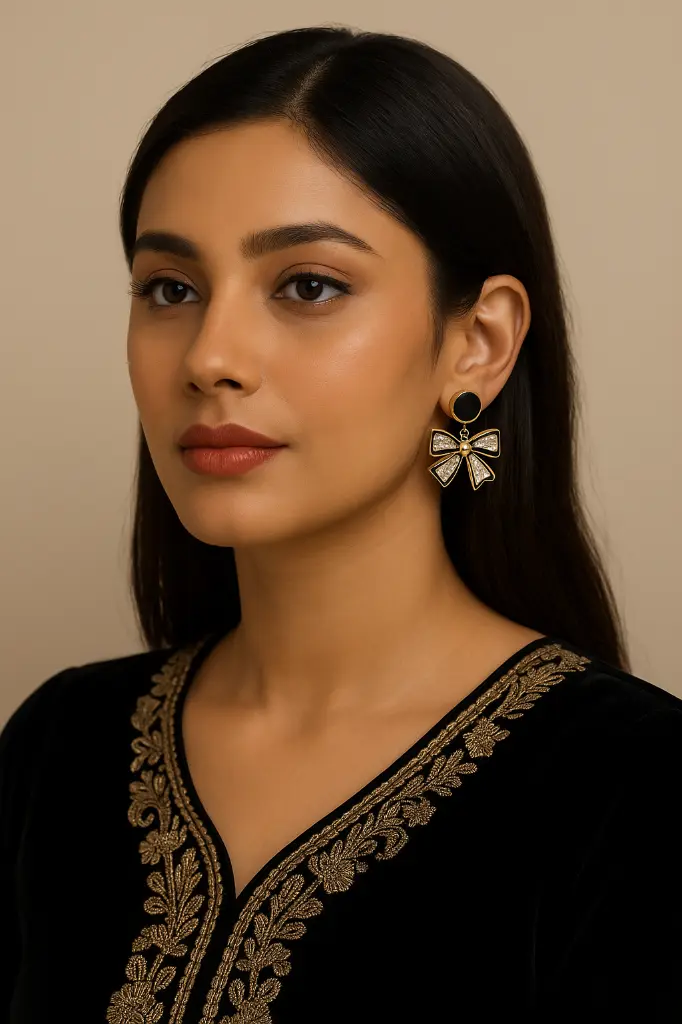 Elegant South Asian Beauty with Bow Earrings.webp