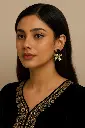Elegant South Asian Beauty with Bow Earrings.webp