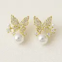 सोने के तितली और मोती बालियां.webp