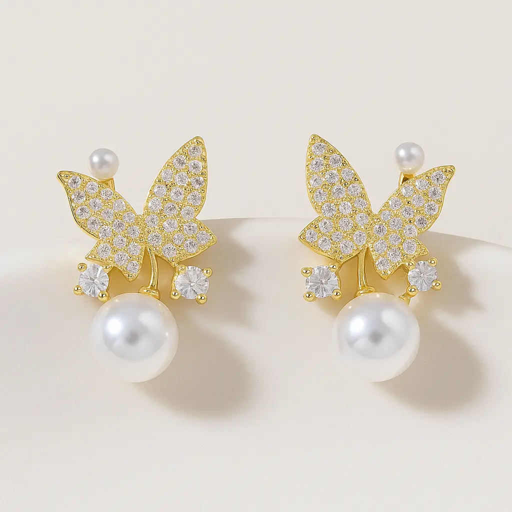 सोने की तितली मोती बालियाँ.webp