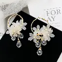 Elegant Gold Hoop Earrings with Crystals.webp