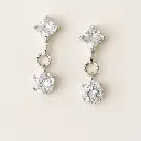 Diamond-Like Earrings on White Background.webp