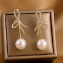 Modern Spiral Design Stud Earrings with Micro-Pave Crystals